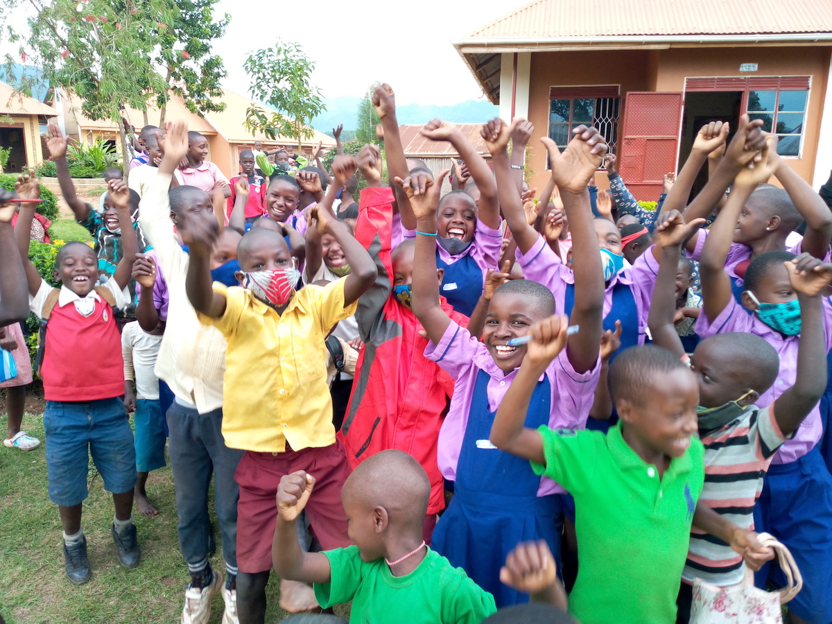 Healthcare professional providing medical care to a child in rural clinic