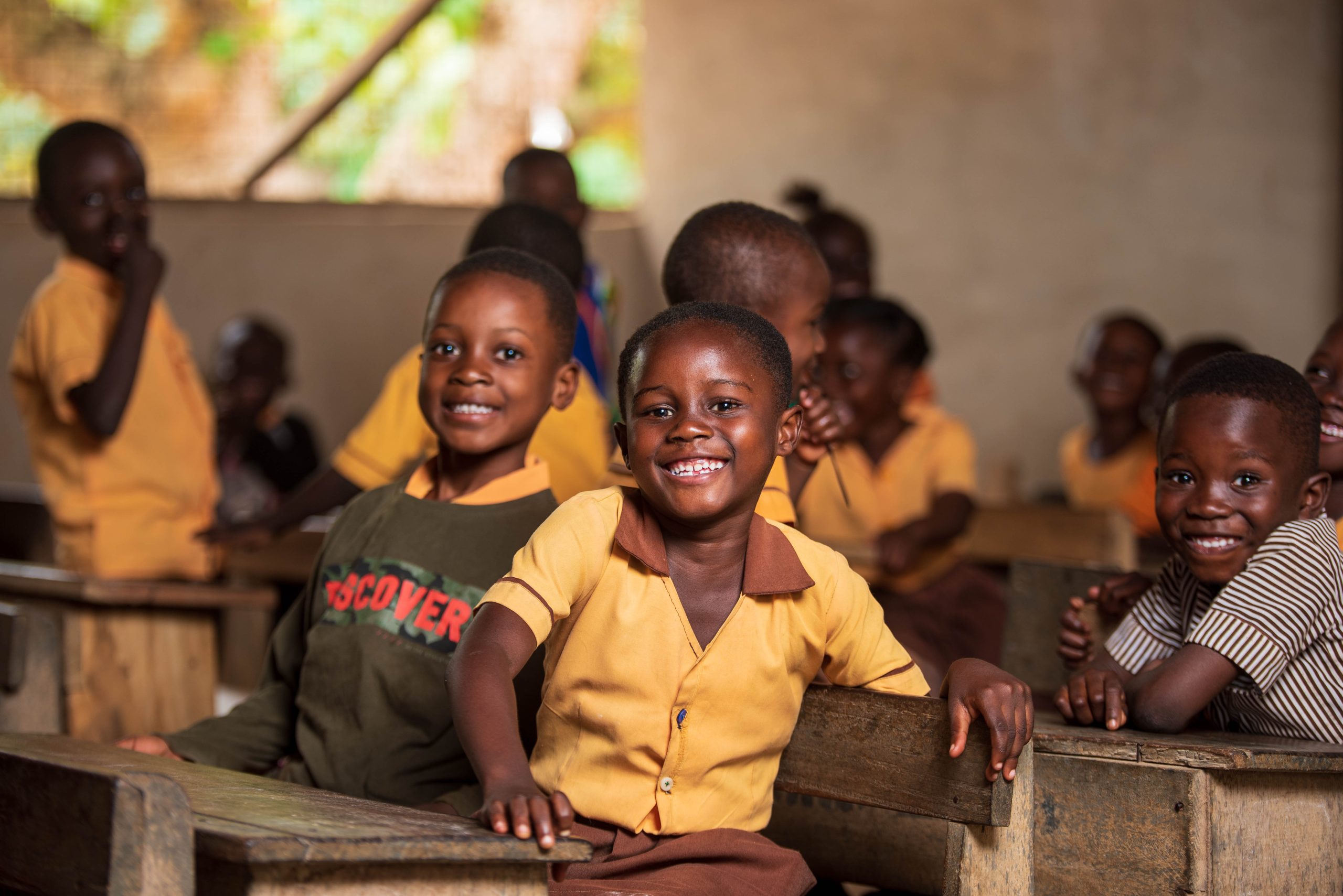 Volunteers distributing educational materials and supplies